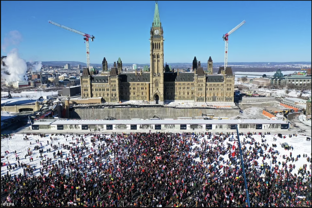 Canadian Prime Minister flees as 50,000 truckers arrive at Ottawa for Freedom Convoy